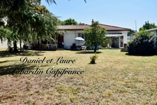 Maison de plain-pied - 4 chambres - garage - terrain clos 