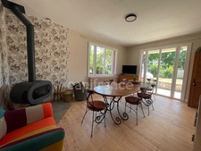 Maison de plain-pied - 4 chambres - garage - terrain clos 