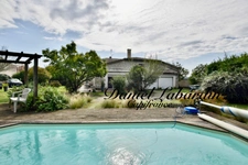 Stone house with 5 bedrooms - swimming pool - garage - drying room in MARMANDE (47)