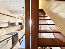 BLANZAT VILLAGE – MAISON DE VILLE EN PIERRE – 2 CHAMBRES – COUR – GARAGE – CAVE – DOUBLE VITRAGE