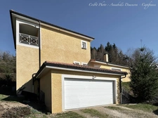 Villa d'architecte P7 à THIERS (CHOPINE) avec vaste terrain, garage double et piscine chauffée.