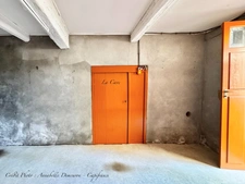 BLANZAT VILLAGE – MAISON DE VILLE EN PIERRE – 2 CHAMBRES – COUR – GARAGE – CAVE – DOUBLE VITRAGE