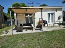 Maison de plain pied - 2 chambres  - 1 abri de jardin - terrain clos avec places de parking