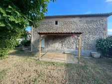 Maison en pierre - 4 chambres - jardin clos - garage - dépendances