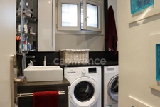 Maison de 116 m² - 4 chambres - proche services à pieds - garage -piscine