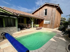 Maison de 116 m² - 4 chambres - proche services à pieds - garage -piscine