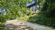Maison familiale d'environ 135 m² avec vue panoramique, au cœur d'un écrin de verdure à CHANAZ (73). À seulement 25 minutes d'Aix-les-Bains, 45 minutes de Chambéry et 50 minutes d'Annecy.