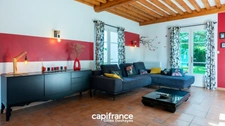 Maison 172 m² habitables, 187 m² au sol, sur un terrain arboré de 1 395 m² en Zone U.