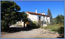 For Sale: Beautiful 1940s villa in Reynes – Rare opportunity with 3 apartments and 3600 m² of land