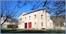 Villa 4 faces à vendre sur 1425 m2 de terrain avec garage et studio indépendant à REYNES (66)