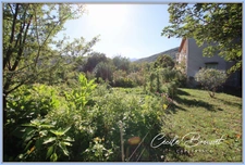 For Sale: Beautiful 1940s villa in Reynes – Rare opportunity with 3 apartments and 3600 m² of land