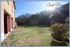 Villa 4 faces à vendre sur 1425 m2 de terrain avec garage et studio indépendant à REYNES (66)