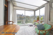 Maison de ville de 116,54 m² de 4 chambres avec une véranda et un garage sur une parcelle de 528m² au bord du Clain.