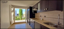 Proche de l'hippodrome, appartement traversant de 72 m² avec cave et garage, bien entretenu, au calme, plein sud, vue dégagée