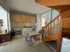 Proche de NOIRETABLE  (42) IMMEUBLE avec 4 logements de 217 M2 (42 ) avec garage et  une remise de 98 M2 