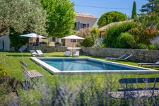 Bastide for sale comprising 4 suites, 1 annex with swimming pool on adjoining land of nearly one hectare OPPEDE (84)