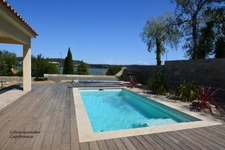 Contemporary 6-room house with swimming pool and view of the olive pond