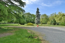 Charmante maison, environnement verdoyant avec 5925 m² de terrain arboré