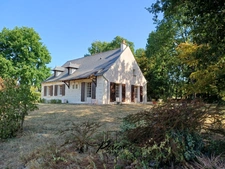 Maison familiale, environnement boisé, vie de plain pied