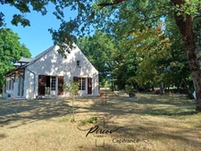 Maison familiale, environnement boisé, vie de plain pied