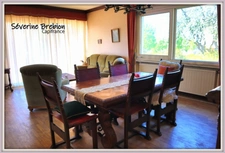 Ensemble immobilier avec une maison, 2 appartements loués, 2 garages, 3 ateliers à Chabreloche.