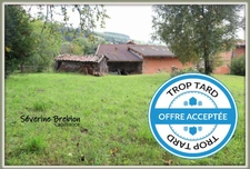 À vendre - Maison à rénover entièrement avec terrain de plus de 1000 m² à Arconsat Prix : 30 000 €