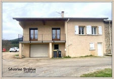 Maison 93 m², bâtie en 2002, 2 chambres avec la possibilité d'en créer une troisième, terrasse, garage + garage double  ARCONSAT (63)