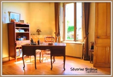 Ensemble immobilier avec une maison, 2 appartements loués, 2 garages, 3 ateliers à Chabreloche.