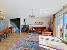 REIGNIER-ÉSERY – Maison mitoyenne 105 m² – 3 chambres – jardin – double garage