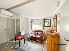 Mobil-Home de 32 M² de 2019, confortable avec belle terrasse et parcelle privative a vendre séparément en PRL.