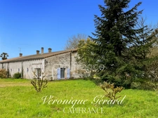 IDEAL INVESTISSEMENT MAISON EN PIERRE SUR 5494 M2 DE TERRAIN UB 