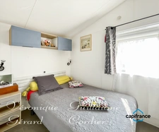 Mobil-Home de 32 M² de 2019, confortable avec belle terrasse et parcelle privative a vendre séparément en PRL.