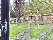 Appartement deux pièces en rez-de-jardin 