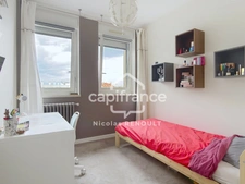 Appartement spacieux avec cave & parking