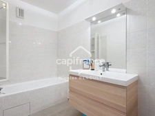 Appartement spacieux avec cave & parking