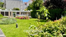 Appartement spacieux avec cave & parking