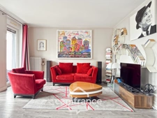 Appartement spacieux avec cave & parking