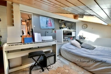 Maison familiale d'environ 160 m² avec piscine, 5 chambres et terrain de plus de 1160 m² au cœur d'un secteur prisé de Reignier