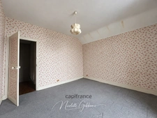 Maison de ville de 107 m² à rénover avec jardin clos – À 10 minutes du centre-ville