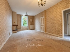 Maison de ville de 107 m² à rénover avec jardin clos – À 10 minutes du centre-ville