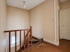 Maison de ville de 107 m² à rénover avec jardin clos – À 10 minutes du centre-ville