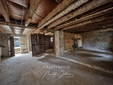 Maison de ville de 107 m² à rénover avec jardin clos – À 10 minutes du centre-ville