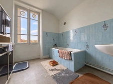 Maison de ville de 107 m² à rénover avec jardin clos – À 10 minutes du centre-ville