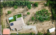Maison bioclimatique plain-pied, autonomie et vue nature, terrain 3 150 m² - LANSAC (66)