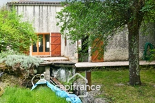 Maison charentaise à vendre 4 pièces LES EGLISES D'ARGENTEUIL (17)avec garage sur 1089m² de jardin arboré