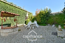 Single-storey house for sale in SAINT JEAN D'ANGELY (17) with 3 rooms, garden and garage, close to shops