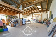 Single-storey house for sale in SAINT JEAN D'ANGELY (17) with 3 rooms, garden and garage, close to shops