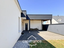 Maison contemporaine de plain-pied de 160 m² – 4 chambres – Véranda de 27 m² avec spa – Double garage – Carport – Noyal-Pontivy