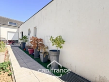 Maison contemporaine de plain-pied de 160 m² – 4 chambres – Véranda de 27 m² avec spa – Double garage – Carport – Noyal-Pontivy