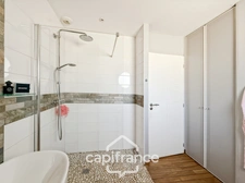 Maison contemporaine de plain-pied de 160 m² – 4 chambres – Véranda de 27 m² avec spa – Double garage – Carport – Noyal-Pontivy